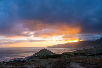 Sunset on Ponta de Sao Lourenco peninsula with small traditional village. Madeira Island Portugal.