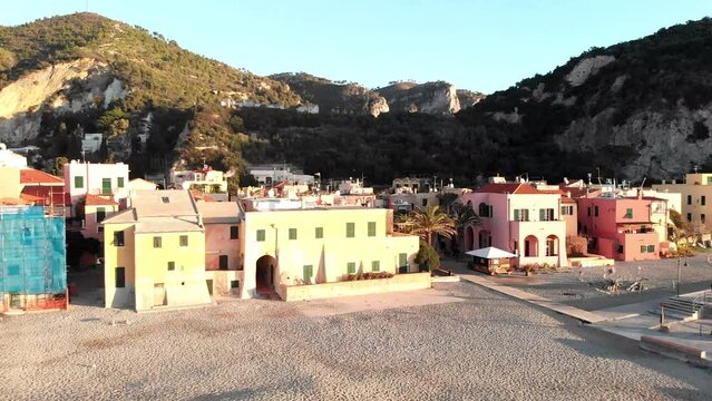 Aerial drone reveal shot of Varigotti on the Italian Riviera during winter morning, Liguria, Savona province,Italy
