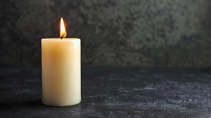 white lit burning candle on side black background. Funeral, mourning, memorial service concept with copy space