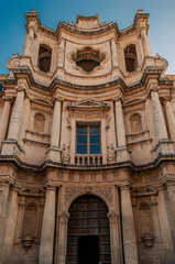 The facade of the church of San Carlo in the main street of the baroque city of Noto, province of Syracuse, Sicily, Italy