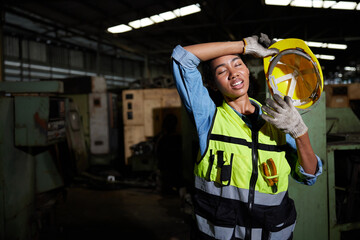 worker or engineer feeling tired from hot weather over heat in the factory