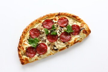 Petite pizza calzone on a white background