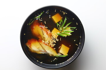 Asian soup in a cup isolated on white background.