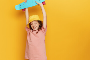 Playful Skater Girl Enjoying a Sunny Day on her Colorful Skateboard