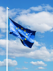 European Union flag. Blue banner with yellow stars