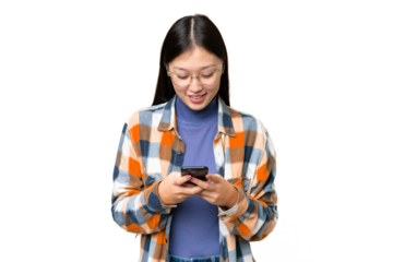 Young Asian woman over isolated chroma key background sending a message with the mobile