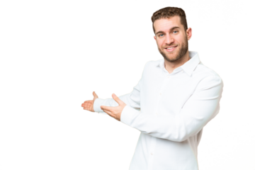 Young handsome blonde man over isolated chroma key background extending hands to the side for inviting to come