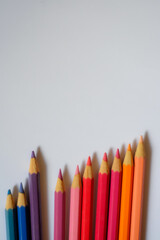 Beautiful colour pencils use as background with copy space. Color pencils isolated on white...