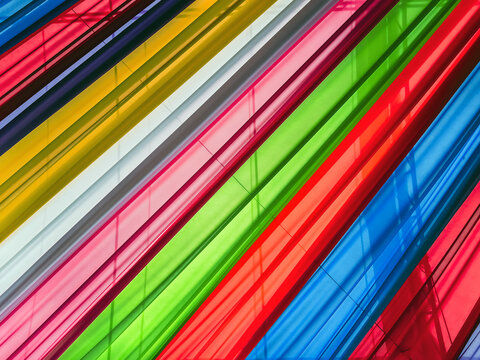 Rainbow cloth roof. Abstract image of tent roof fabricated from multicolored fabric. Colorful fabric in the festival. Multicolored backgrounds from fabrics of different colors, textured with patterns.