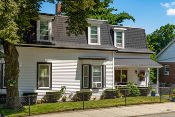 Classic design single-family home facade on a sunny summer day in Brighton, Massachusetts, USA