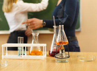 Chemistry laboratory glassware with liquid formula