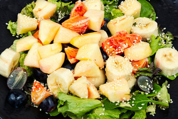 Fruit salad with oranges, closeup. - 784638890