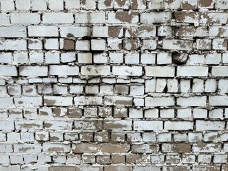 Old white painted brick wall.