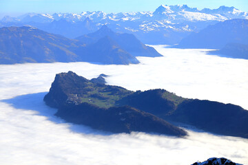 View of Lake Lucerne from mount Pilatus - in the fog. Switzerland near Lucerne, Europe.