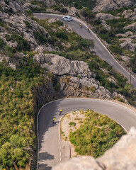 The famous Sa Calobra road in Mallorca, Spain, a favorite place for all cyclists. Lonely cyclists...