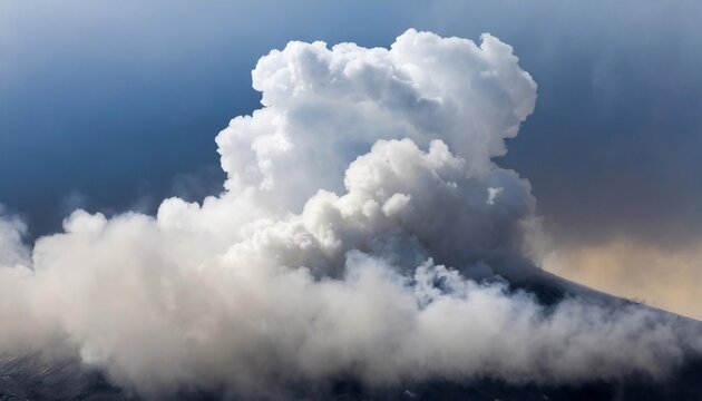 A large, dense cloud of white-gray smoke billows from a ground source into a clear blue sky.