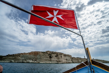 Malta flag in the wind. Sunny day - 784657820