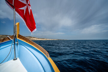 Malta flag in the wind. Sunny day - 784657831