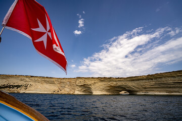 Malta flag in the wind. Sunny day - 784658052