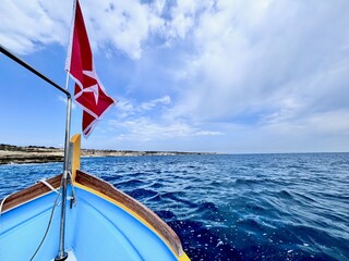 Malta flag in the wind. Sunny day