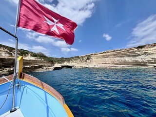 Malta flag in the wind. Sunny day - 784658483