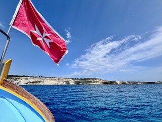 Malta flag in the wind. Sunny day - 784658629