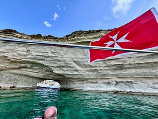 Malta flag in the wind. Sunny day - 784658683