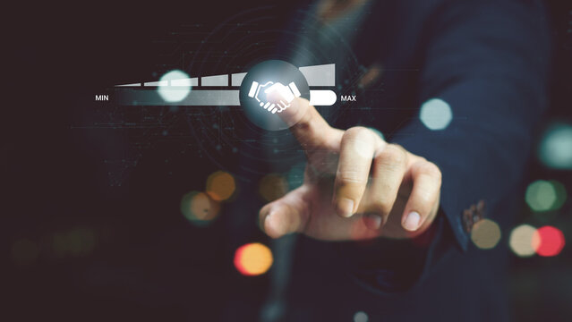 Trusted partner. Trustworthy collaboration, company or contract. Confidence to work together. Businessman turning knob to highest trust levels. Build trust in business and finance relationships.