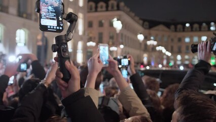 Paparazzi taking photos on the red carpet. Close up photo cameras. 
