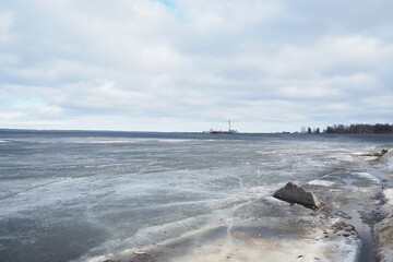 Ice drift in spring on Lake Onega, Karelia. Dangerous thin spring ice in April. Aggregate...