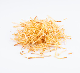 portion of shoestring potatoes scattered in white background top view