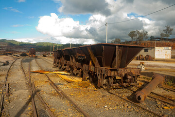 rusty mine cart abandoned on a track