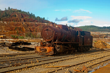 Fototapeta na wymiar rusty steam locomotive abandoned on a track