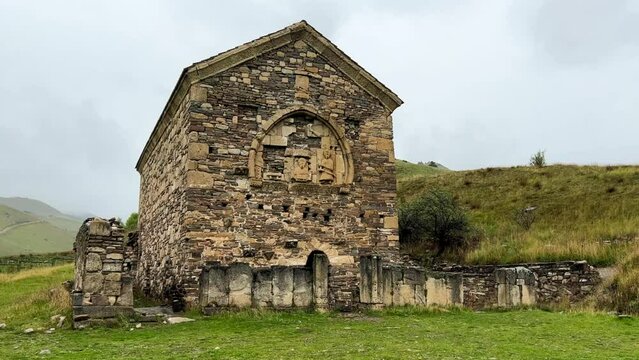 Thaba-Yerdy in Ingushetia. ZEISS, RUSSIA - MAY 19, 2023: Video of the Thaba-Yerdy Temple, the oldest temple in Ingushetia. The Caucasus Mountains. 4K	