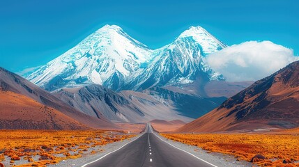A long road with mountains in the background
