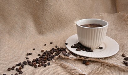 cup of coffee with beans