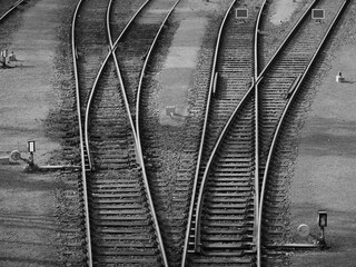 Deutsche Bahn lines, rails and tracks for trains, switching systems, infrastructure, mobility, sustainability, black and white photo