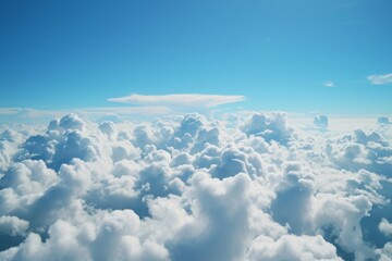 Fototapeta premium This photo captures a stunning view of the clouds as seen from the window of an airplane flying at high altitude, A view of spacious white clouds in a bright blue sky, AI Generated