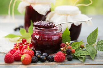 Delicious berry jam in a jar