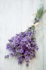 A bouquet of fresh, fragrant lavender on a wooden background
