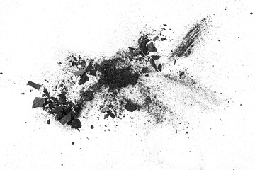 Black coal dust with effect fragments explosion isolated on a white background, view from above.