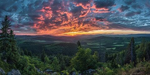 Breathtaking Panoramic Sunset Over Lush Forest Mountains