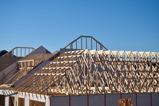 Rafters and trusses roof framing on a new residential home construction