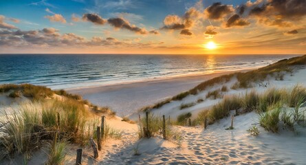 sunset over the beach .  Sunset at the dune beach