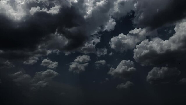 evening clouds fast moving away, rolling dark sunset clouds, black gray white blue glow sunset sky cloud black gray cloudscape time lapse background dark black white sunset sky cloud timelapse,full hd