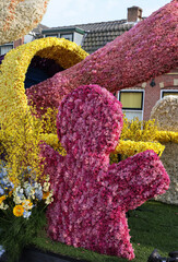 Silhouette of man made of hyacinths presented  in Noordwijkerhout