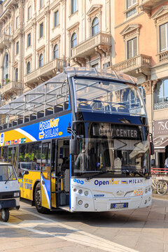 Milan, Italy - April 07, 2018: Open Tour double decker bus near La Scala theatre in Milan.
