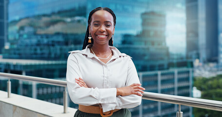 Black woman, face and arms crossed, lawyer happy with career and confident on rooftop, skyscraper...