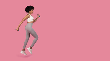 Fototapeta na wymiar Black lady in workout motion side view