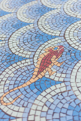 Beautiful mosaic of a chameleon - public art